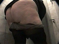 Huge wrinkled ass in front of spy cam in public WC voyeur video #2