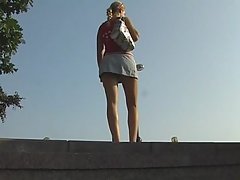 Miniskirt upskirt video made by hunter following a hot girl on the bridge voyeur video #2
