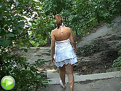 Unsuspecting slut gets undressed on the streets voyeur video #1