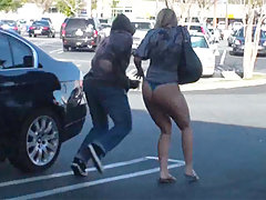 Two hot chicks get pantsed in public! voyeur video #2