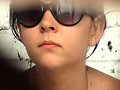 A glance at bikini girls' slits from spycammed WC voyeur video #3