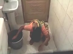Mature aunty cought in her toilet voyeur video #2