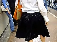 Nice lady in black skirt doesn't notice the guy shooting her panties voyeur video #4